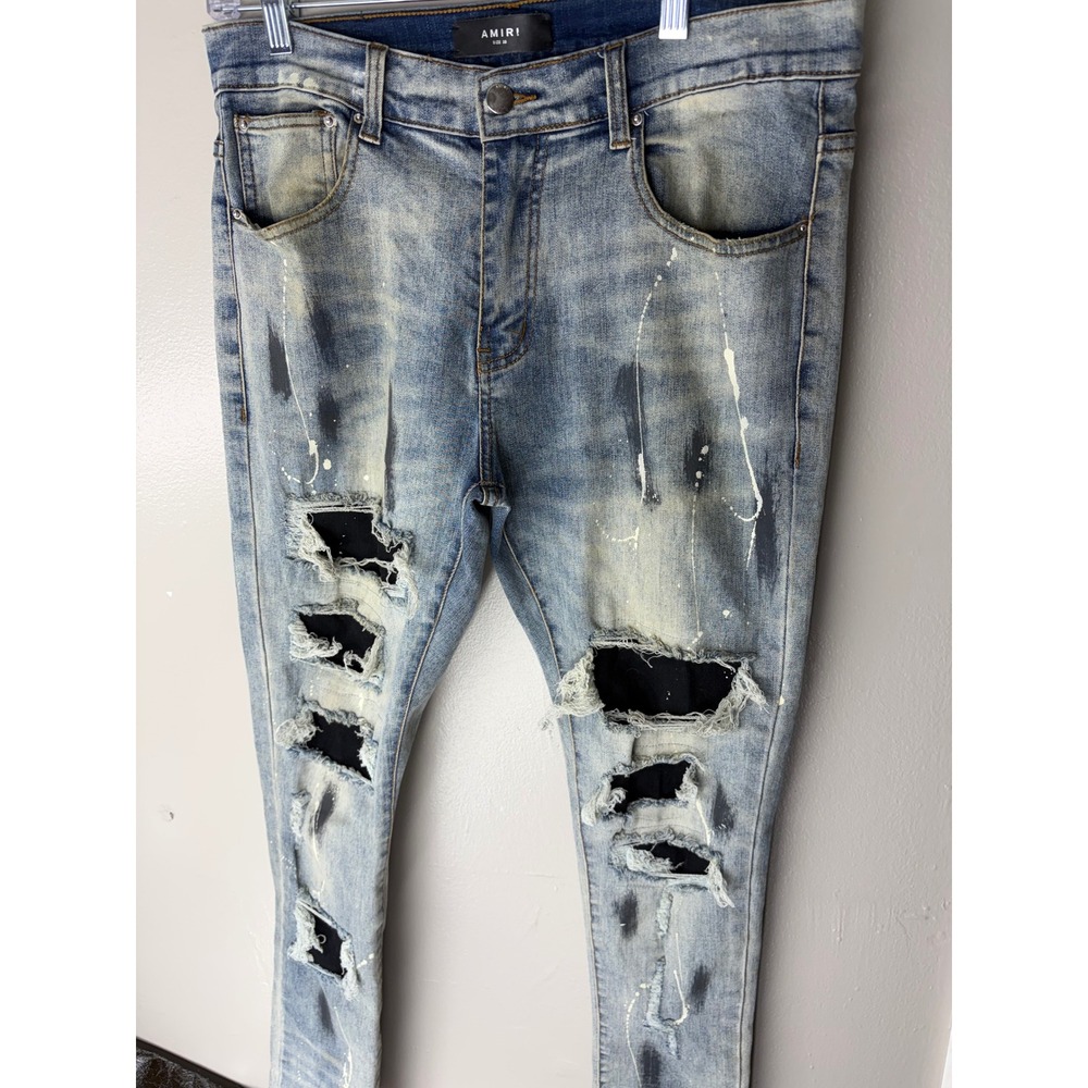 Amiri Mens Distressed Skinny Jeans Light Wash Blue Paint Splatter Size 33